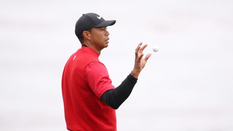 Tiger Woods of the United States catches a ball on the fifth green during the final round of the 2019 U.S. Open at Pebble Beach Golf Links on June 16, 2019 in Pebble Beach, California. 