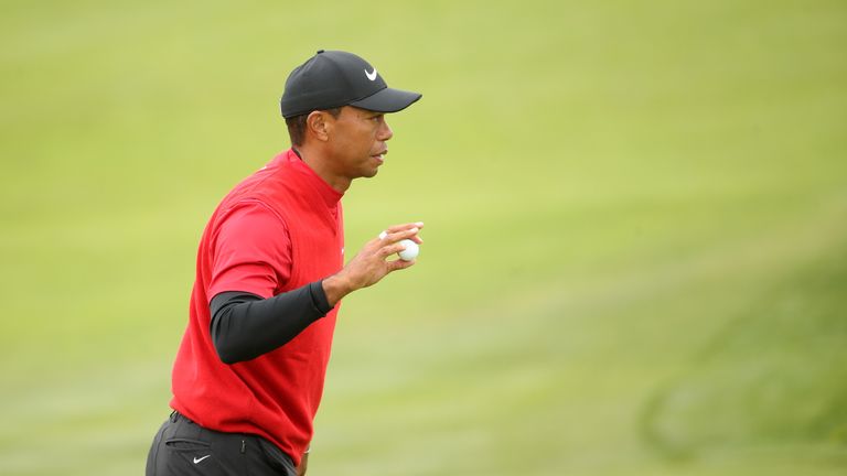 Tiger Woods of the United States waves on the eighth green during the final round of the 2019 U.S. Open at Pebble Beach Golf Links on June 16, 2019 in Pebble Beach, California