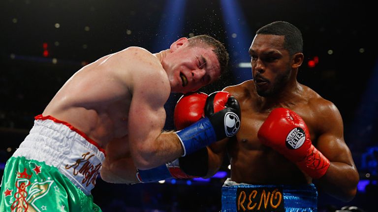 Tureano Johnson punches Eamonn O'Kane during their IBF Middleweight Title eliminator bout at Madison Square Garden on October 17, 2015 in New York City.