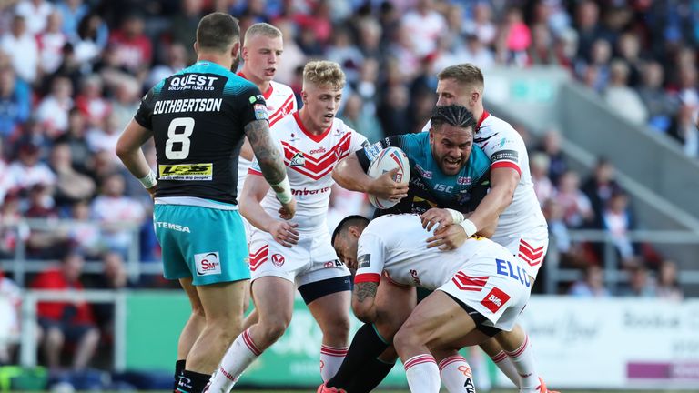 Zeb Taia tackles Konrad Hurrell before he was forced off with an arm injury