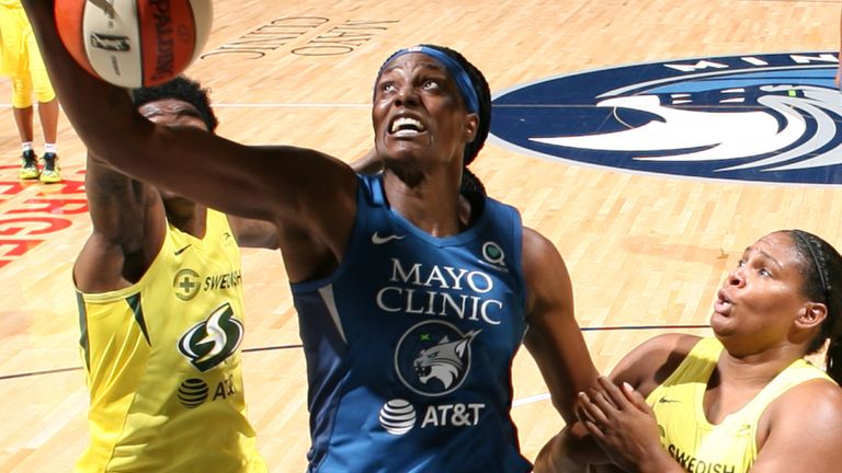 Sylvia Fowles attacks the basket for the Minnesota Lynx against the Seattle Storm