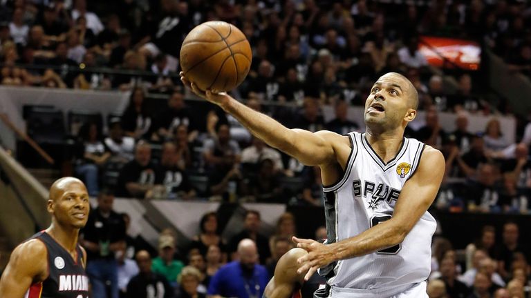 Tony Parker scores with a trademark scoop shot for the San Antonio Spurs