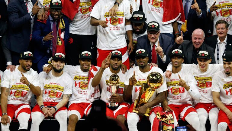 The Toronto Raptors celebrate after beating the Golden State Warriors to win their first NBA championship