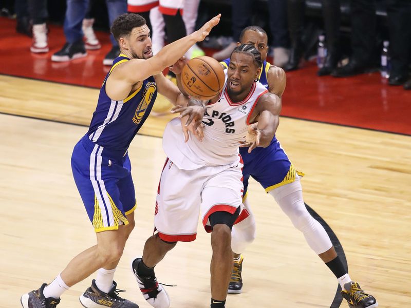 Warriors edge Raptors to keep NBA title hopes alive