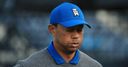 Holmes leads Open as big two falter