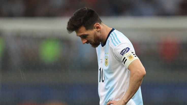 Dejected: Lionel Messi at full-time