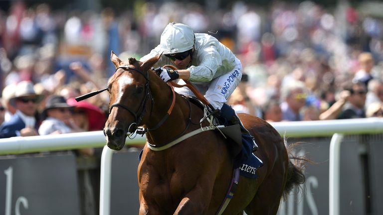 Communique, ridden by jockey Silvestre de Sousa, wins at Newmarket