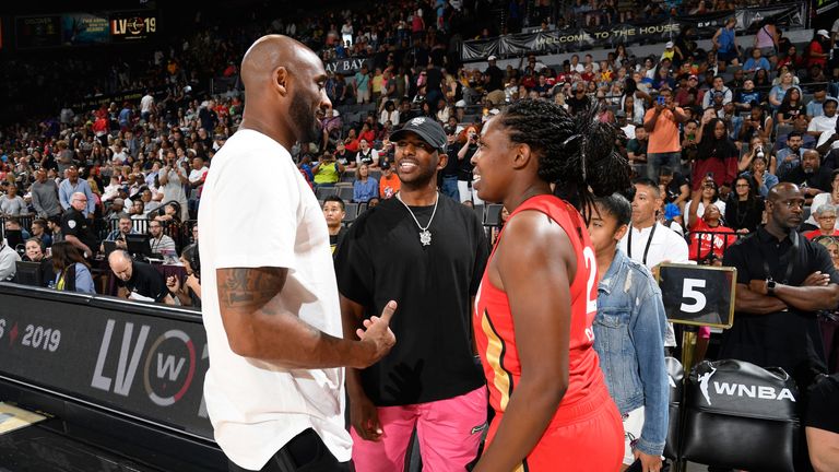 Kobe Bryant and Chris Paul chat with Clesea Gray at the WNBA All-Star-Game