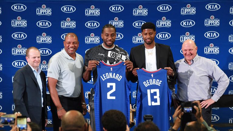 Lawrence Frank, Doc Rivers and Steve Ballmer welcome Kawhi Leonard and Paul George to the Los Angeles Clippers