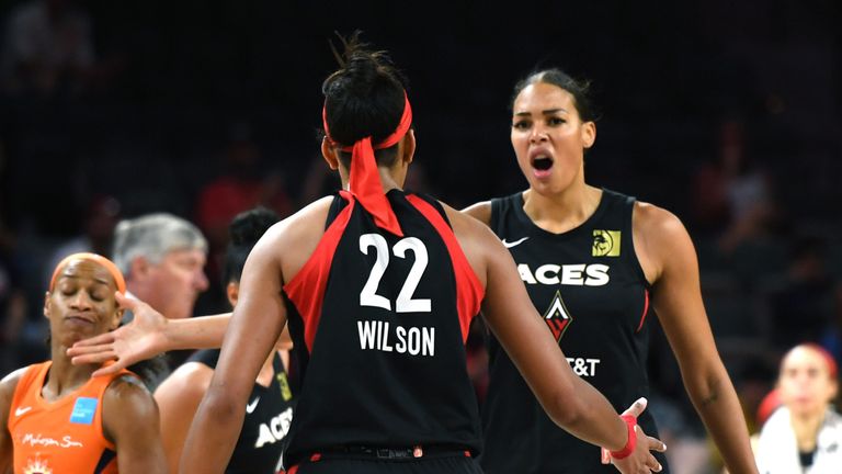 Liz Cambage and A&#39;ja Wilson celebrate an Aces win