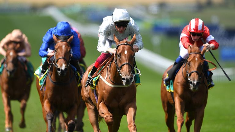 Raffle Prize ridden by jockey Frankie Dettori (centre) on his way to winning the Duchess of Cambridge Stakes
