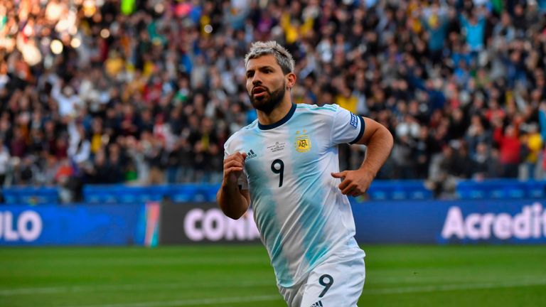 Sergio Aguero wheels away after slotting Argentina's opener against Chile