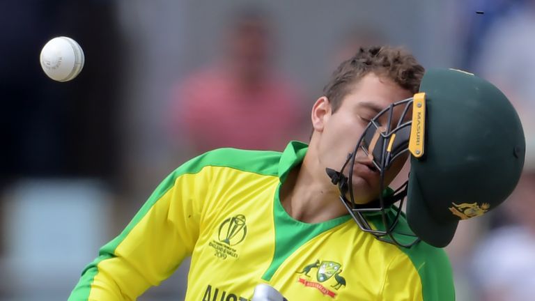 Alex Carey has his helmet knocked off by a Jofra Archer bouncer during Australia vs England Cricket World Cup semi-final at Edgbaston