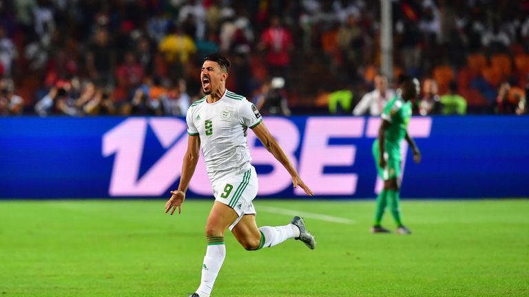 Algeria's forward Baghdad Bounedjah celebrates after scoring a goal during the 2019 Africa Cup of Nations (CAN) Final football match between Senegal and Algeria at the Cairo International Stadium in Cairo on July 19, 2019. (Photo by Giuseppe CACACE / AFP) (Photo credit should read GIUSEPPE CACACE/AFP/Getty Images)