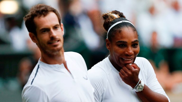 Andy Murray (L) and US player Serena Williams (R) react as they watch a hawkeye review that Murray had called for against France's Fabrice Martin and US player Raquel Atawo during their mixed doubles second round match on day eight of the 2019 Wimbledon Championships at The All England Lawn Tennis Club in Wimbledon, southwest London, on July 9, 2019.