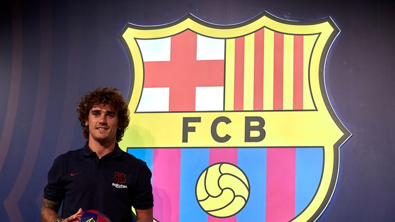New Barcelona signing Antoine Griezmann poses for the cameras