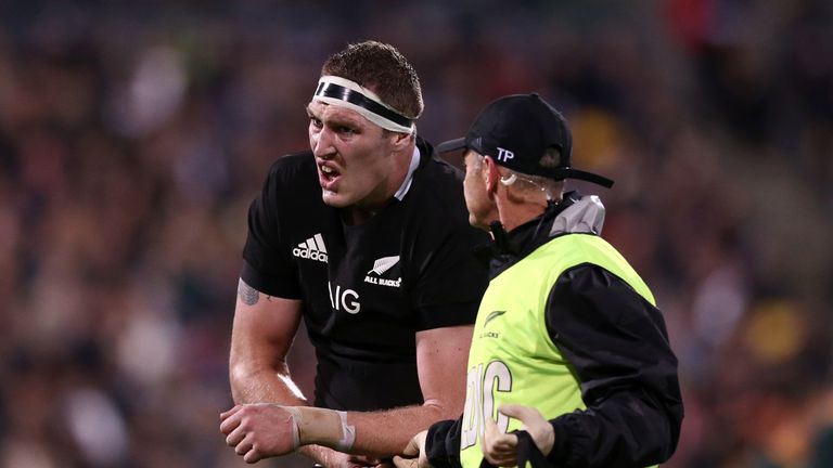 Brodie Retallick winces in pain after dislocating his shoulder