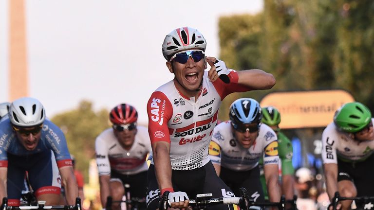 Caleb Ewan celebrates winning the final stage on the Champs-Elysees