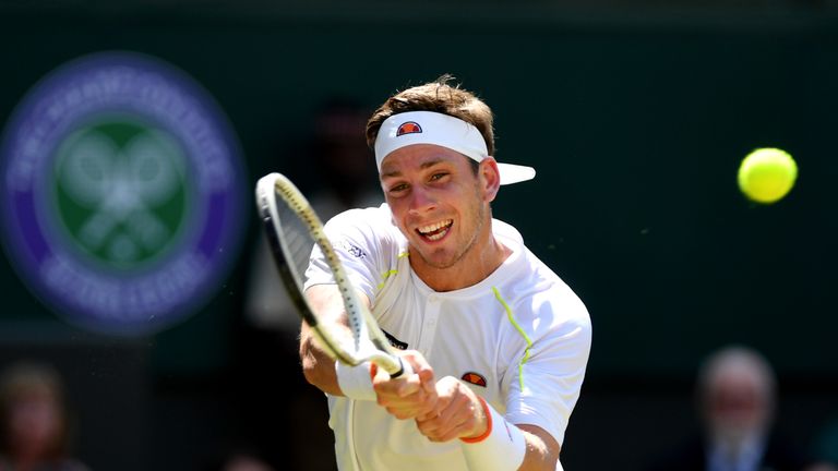 Cameron Norrie of Great Britain plays a forehand in his Men's Singles second round match against Kei Nishikori of Japan during Day four of The Championships - Wimbledon 2019 at All England Lawn Tennis and Croquet Club on July 04, 2019 in London, England.