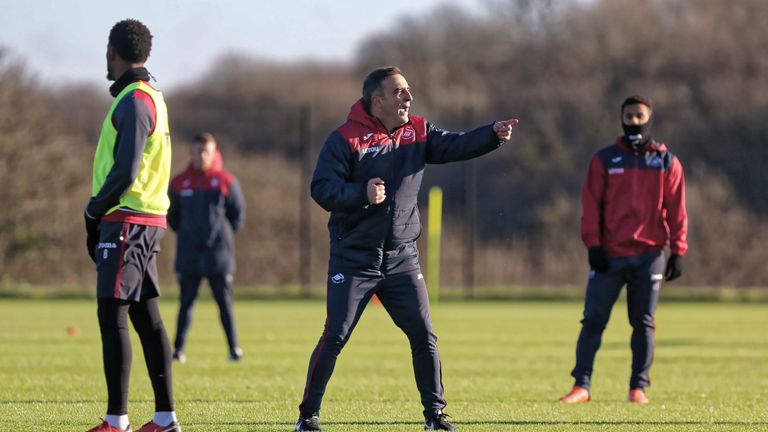SWANSEA, WALES - DECEMBER 28: Manager Carlos Carvalhal gives instructions to his players during the Swansea City Training at The Fairwood Training Ground on December 28, 2017 in Swansea, Wales. (Photo by Athena Pictures/Getty Images)