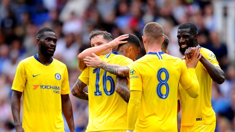 Chelsea players celebrate Kenedy's goal against Reading