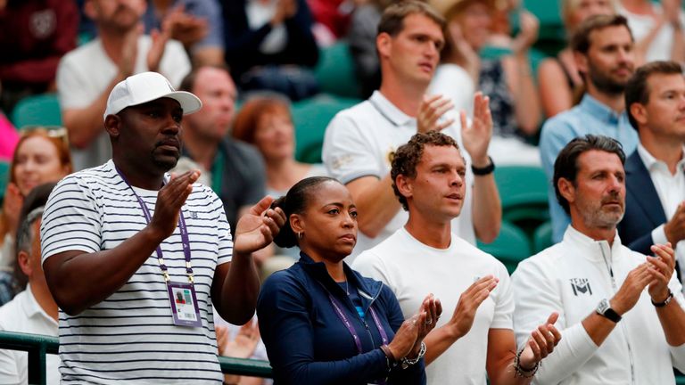 Corey Gauff (L) and Candi Gauff, parents of US player Cori Gauff, and tennis coach Patrick Mouratoglou (R), cheer as Guaff plays against Slovakia's Magdalena Rybarikova during their women's singles second round match on the third day of the 2019 Wimbledon Championships at The All England Lawn Tennis Club in Wimbledon, southwest London, on July 3, 2019