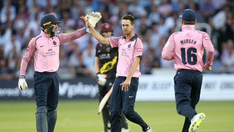 Nathan Sowter celebrates a wicket with Middlesex wicketkeeper John Simpson