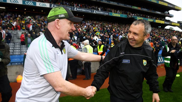 Declan Bonner and Peter Keane shake hands at full-time