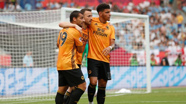 NANJING, CHINA - JULY 17: Diogo Jota #18 of Wolverhampton Wanderers celebrates after scoring his team&#39;s goal during Premier League Asia Trophy - Newcastle United v Wolverhampton Wanderers on July 17, 2019 in Nanjing, China. (Photo by Fred Lee/Getty Images for Premier League)