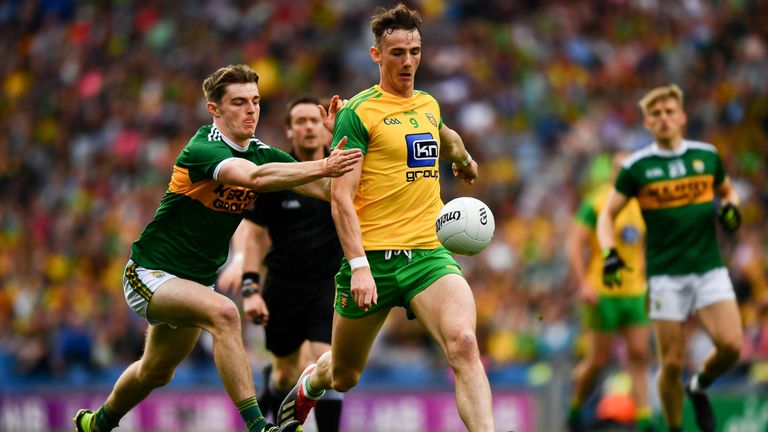 Jason McGee gets a shot away despite the attention of Diarmuid O'Connor