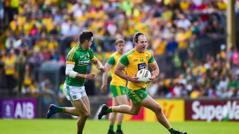 Michael Murphy of Donegal in action against Ethan Devine of Meath