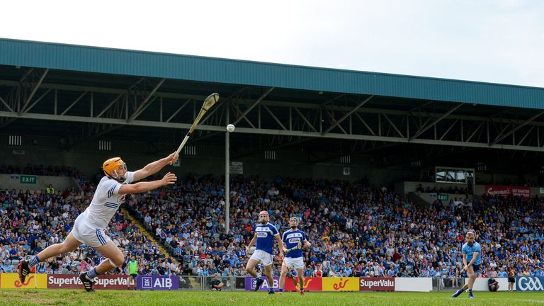 Enda Rowland blocks a shot from Danny Sutcliffe