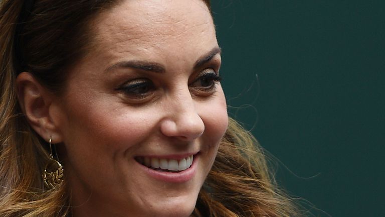 Britain's Catherine, Duchess of Cambridge arrives at court 14 at The All England Tennis Club in Wimbledon, southwest London, on July 2, 2019, to watch Britain's Harriet Dart play against US player Christina McHale during their women's singles first round match on the second day of the 2019 Wimbledon Championships tennis tournament.