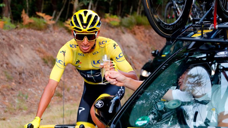 Tour de France winner Egan Bernal enjoys some champagne on the run-in to Paris 