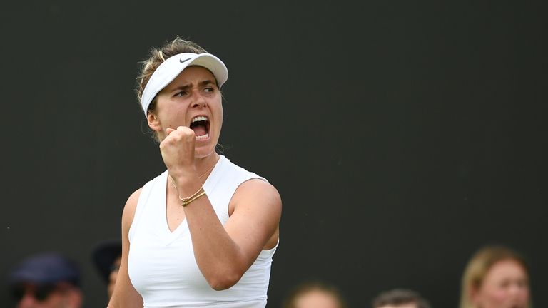 Ukraine's Elina Svitolina celebrates after winning a point against Croatia's Petra Martic during their women's singles fourth round match on the seventh day of the 2019 Wimbledon Championships at The All England Lawn Tennis Club in Wimbledon, southwest London, on July 8, 2019