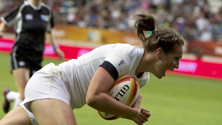 Emily Scarratt scores a try during the Women's Rugby World Cup final match against Canada in 2014