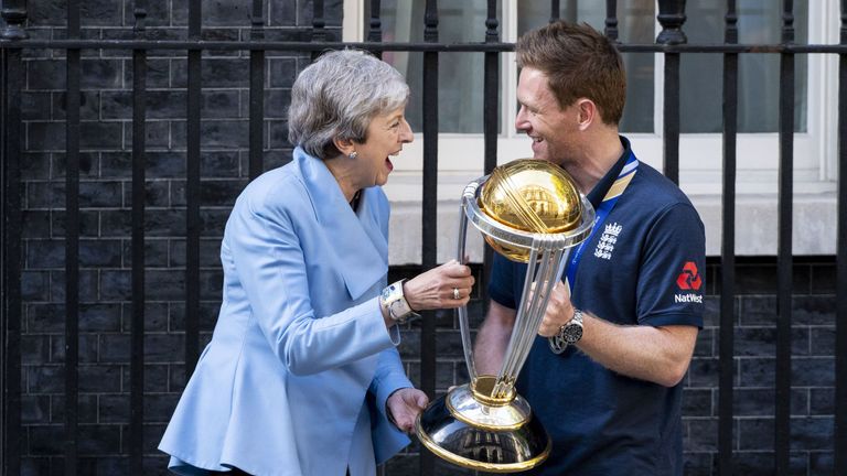 Theresa May and Eoin Morgan with the Cricket World Cup trophy
