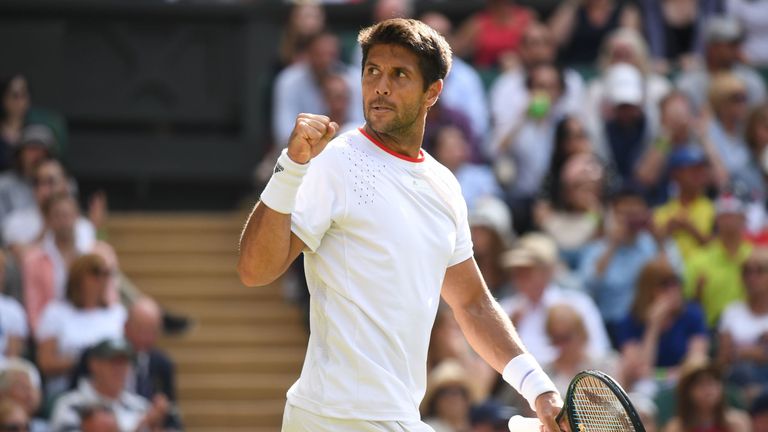 Fernando Verdasco celebrates winning the third set against Britain's Kyle Edmund during their men's singles second round match on the third day of the 2019 Wimbledon Championships at The All England Lawn Tennis Club in Wimbledon, southwest London, on July 3, 2019