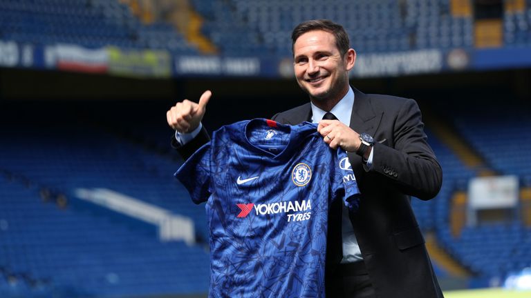 New Chelsea head coach Frank Lampard poses for a photo inside Stamford Bridge