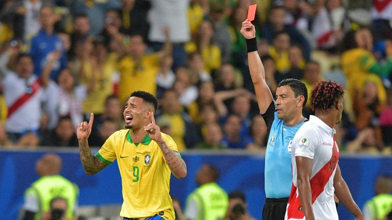 Gabriel Jesus is shown the red card after picking a second yellow in the Copa America final