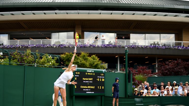 Harriet Dart of Great Britain serves in her Ladies' Singles first round match against Christina McHale of The United States during Day two of The Championships - Wimbledon 2019 at All England Lawn Tennis and Croquet Club on July 02, 2019 in London, England