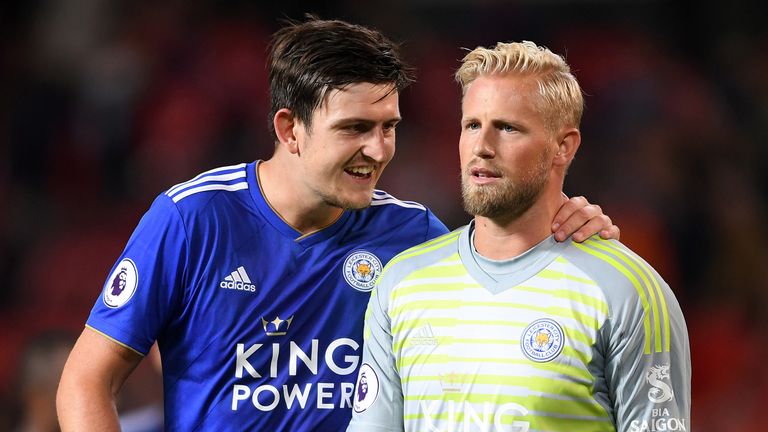 Harry Maguire of Leicester City embraces Kasper Schmeichel of Leicester City after the Premier League match between Manchester United and Leicester City at Old Trafford on August 10, 2018 in Manchester, United Kingdom. 