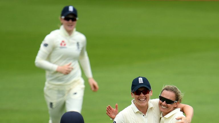 England captain Heather Knight congratulates Laura Marsh on the wicket of Elysse Perry 