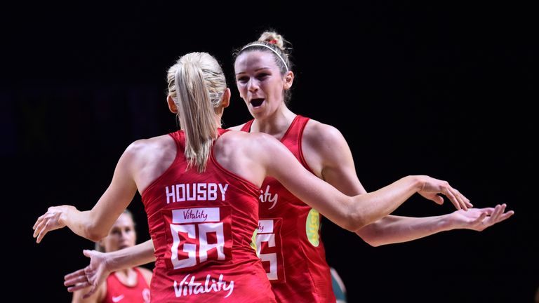 Helen Housby and Jo Harten teamed up again to give England sixth victory at the Netball World Cup and a semi-final against New Zealand.