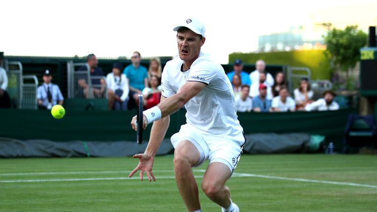 Jamie Murray of Great Britain, playing partner of Neal Skupski of Great Britain plays a forehand in their Men's Doubles first round match against Ivan Dodig of Croatia and Filip Polasek of Slovakia during Day four of The Championships - Wimbledon 2019 at All England Lawn Tennis and Croquet Club on July 04, 2019 in London, England