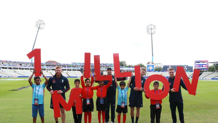 England's Jonny Bairstow, Liam Plunkett, Joe Root and Jason Roy help celebrate the milestone