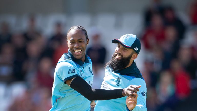 Jofra Archer and Moeen Ali celebrate a wicket 