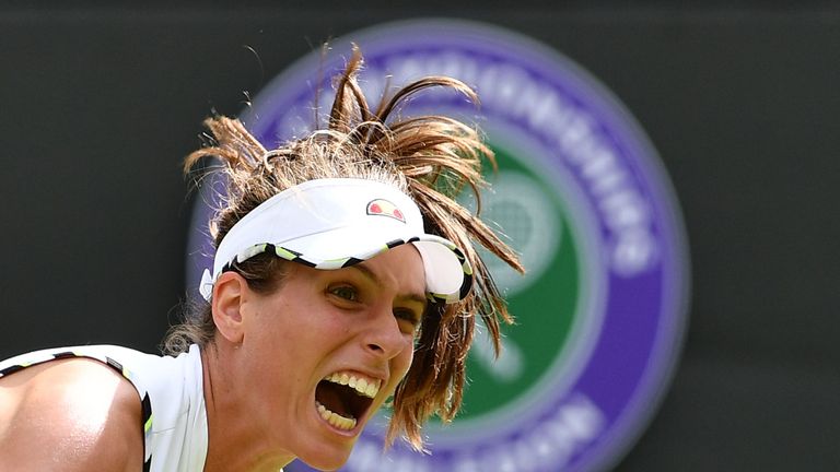 Johanna Konta serves against Romania's Ana Bogdan during their women's singles first round match on the second day of the 2019 Wimbledon Championships at The All England Lawn Tennis Club in Wimbledon, southwest London, on July 2, 2019.