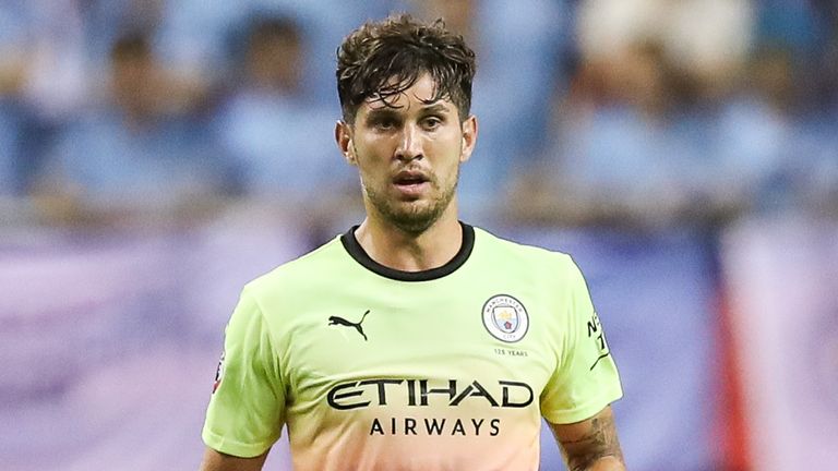 John Stones has been backed by manager Pep Guardiola to improve at Manchester City