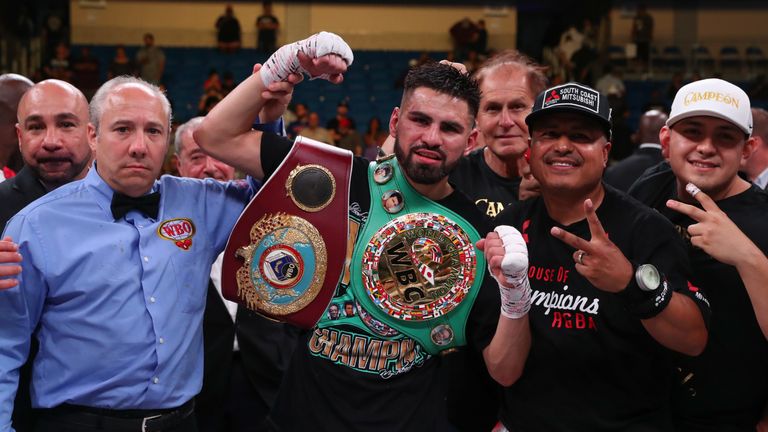 Jose Ramirez celebrates after unifying the super-lightweight titles